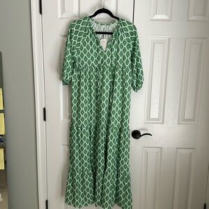 NWT Women’s green pattern long dress. Size small, but wears loose.